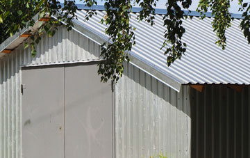 repairing Brooms Barn metal garage roofing